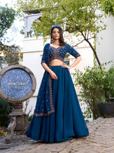 Firozi Color Plain With Sequins And Thread Embroidery Work Georgette Lehenga Choli